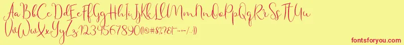 Haertbel Script-fontti – punaiset fontit keltaisella taustalla