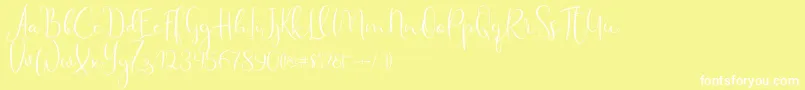 Haertbel Script Font – White Fonts on Yellow Background