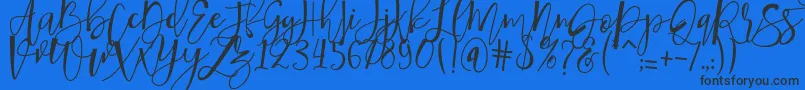 hafizan script Font – Black Fonts on Blue Background