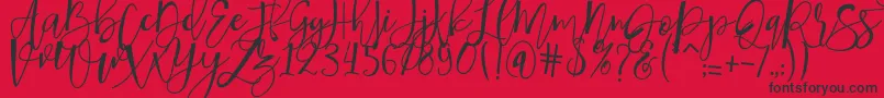 Fonte hafizan script – fontes pretas em um fundo vermelho