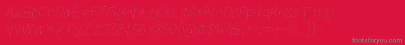 Kabinaltobl-Schriftart – Graue Schriften auf rotem Hintergrund