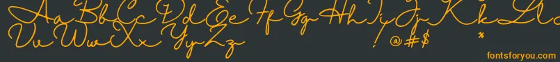 Halimun Font – Orange Fonts on Black Background