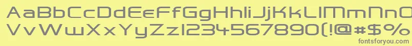 フォントHall Fetica Wide – 黄色の背景に灰色の文字