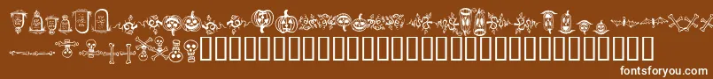 halloween borders-Schriftart – Weiße Schriften auf braunem Hintergrund