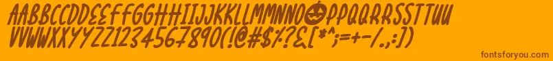Czcionka Halloween Treats Italic – brązowe czcionki na pomarańczowym tle