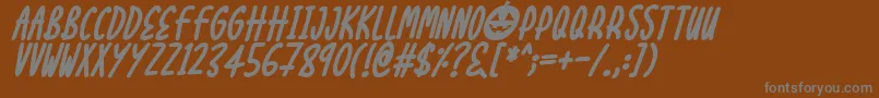 Шрифт Halloween Treats Italic – серые шрифты на коричневом фоне