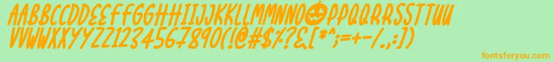Czcionka Halloween Treats Italic – pomarańczowe czcionki na zielonym tle