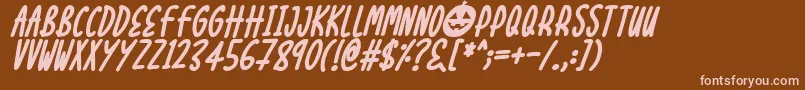 Halloween Treats Italic-fontti – vaaleanpunaiset fontit ruskealla taustalla