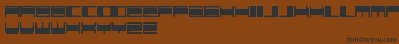 Шрифт VokerBaxerFreePromo – чёрные шрифты на коричневом фоне