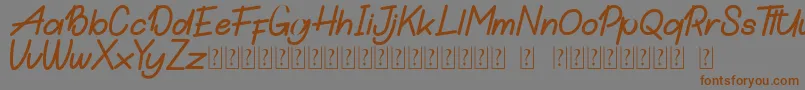 Hamilton DEMO-Schriftart – Braune Schriften auf grauem Hintergrund