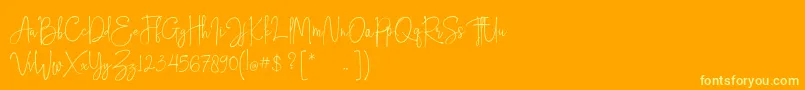 Hampton free personal use-Schriftart – Gelbe Schriften auf orangefarbenem Hintergrund