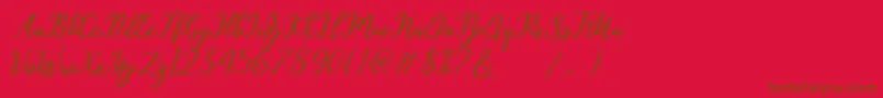 hamster-Schriftart – Braune Schriften auf rotem Hintergrund