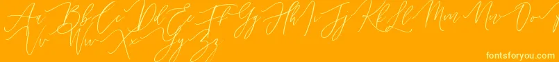 Handita Font – Yellow Fonts on Orange Background