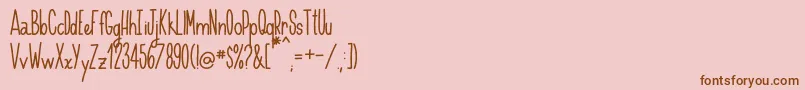 Handnilo Font – Brown Fonts on Pink Background