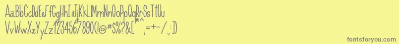 More about Handnilo Font Handnilo Font – Gray Fonts on Yellow Background