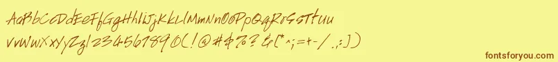 Fonte Handscript – fontes marrons em um fundo amarelo