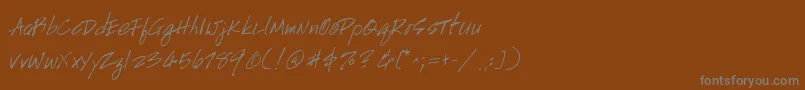 フォントHandscript – 茶色の背景に灰色の文字