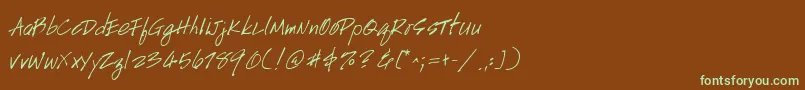 フォントHandscript – 緑色の文字が茶色の背景にあります。