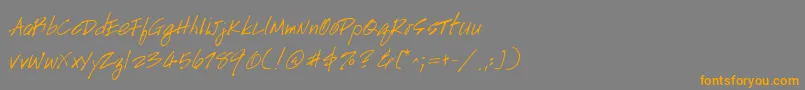 フォントHandscript – オレンジの文字は灰色の背景にあります。