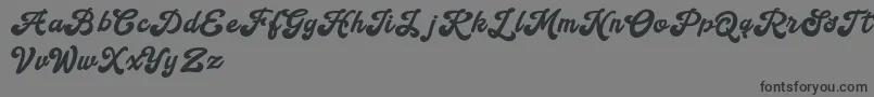 フォントHandy Script – 黒い文字の灰色の背景
