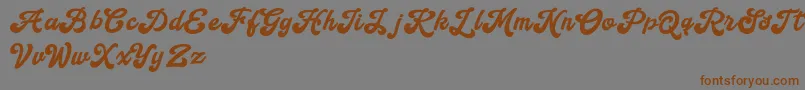 Handy Script Font – Brown Fonts on Gray Background
