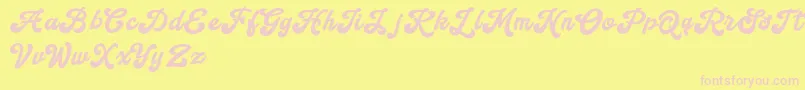 Handy Script-fontti – vaaleanpunaiset fontit keltaisella taustalla