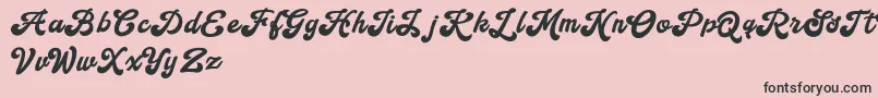 Więcej informacji o czcionce Handy Script Czcionka Handy Script – czarne czcionki na różowym tle