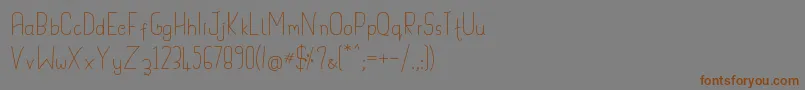 Handypot Font – Brown Fonts on Gray Background