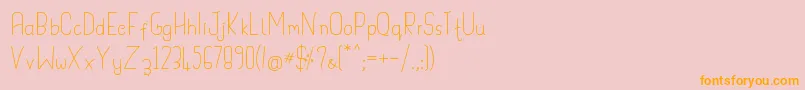 フォントHandypot – オレンジの文字がピンクの背景にあります。