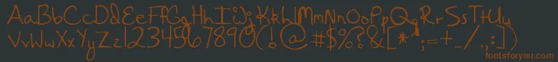 HangingByaThread Font – Brown Fonts on Black Background