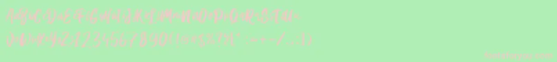 Hanomali Demo-Schriftart – Rosa Schriften auf grünem Hintergrund