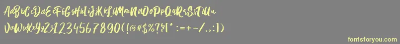 Hanomali Demo Font – Yellow Fonts on Gray Background