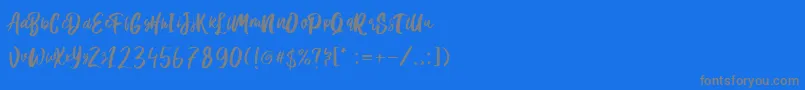 Hanomali Demo-Schriftart – Graue Schriften auf blauem Hintergrund