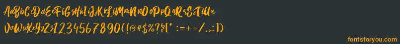 フォントHanomali Demo – 黒い背景にオレンジの文字