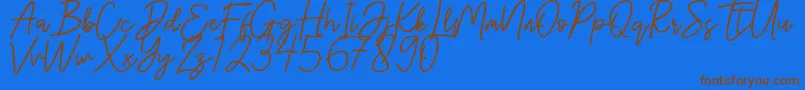 Hanster Font – Brown Fonts on Blue Background