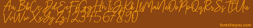 Hanster Font – Orange Fonts on Brown Background