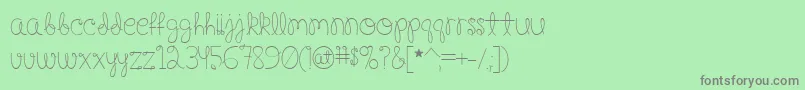 Fonte Happy Birthday, Baby – fontes cinzas em um fundo verde