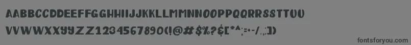 Happy Clover Display Font – Black Fonts on Gray Background