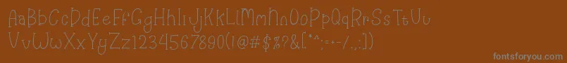 Шрифт Happy Clover – серые шрифты на коричневом фоне