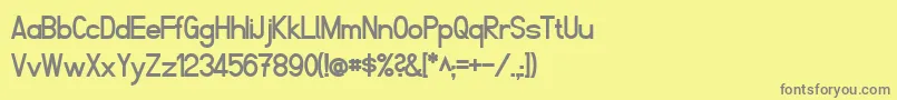 フォントFibelNordBold – 黄色の背景に灰色の文字