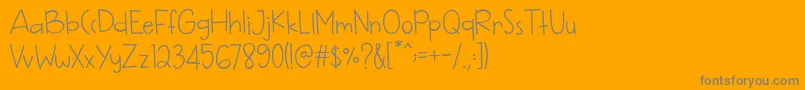 フォントHappy Monday – オレンジの背景に灰色の文字