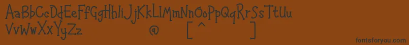 Шрифт HAPPYK 1 – чёрные шрифты на коричневом фоне