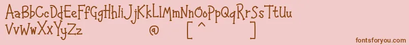 フォントHAPPYK 1 – ピンクの背景に茶色のフォント