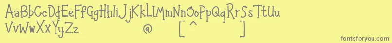 フォントHAPPYK 1 – 黄色の背景に灰色の文字