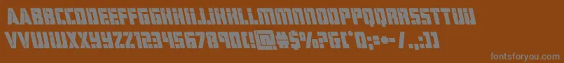 hardscienceboldleft-fontti – harmaat kirjasimet ruskealla taustalla