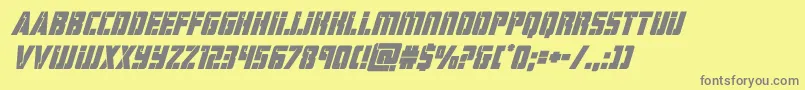 フォントhardscienceboldsuperital – 黄色の背景に灰色の文字