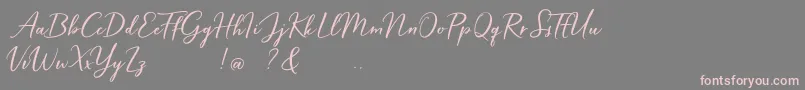Hardwired Script Free-Schriftart – Rosa Schriften auf grauem Hintergrund