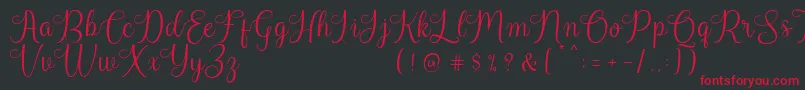 Harland Reguler Demo Font – Red Fonts on Black Background