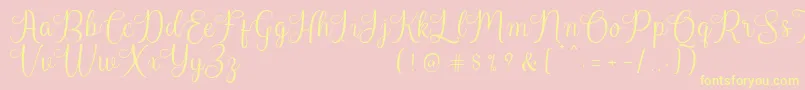 Harland Reguler Demo Font – Yellow Fonts on Pink Background