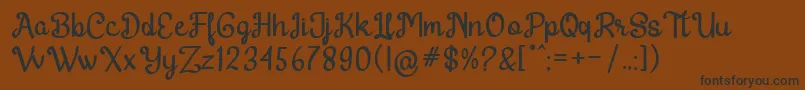 Harton Regular-Schriftart – Schwarze Schriften auf braunem Hintergrund